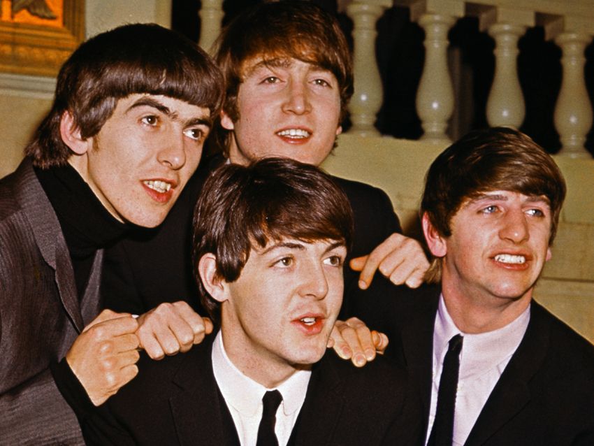all four of the beatles looking like dicks